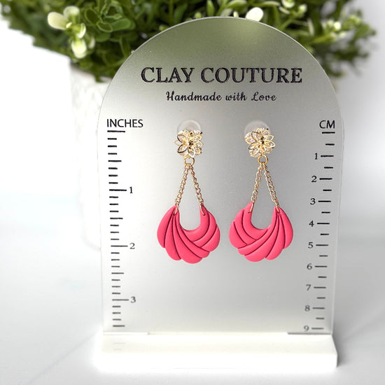 Floral Cascade earrings in blush Rose on clay couture branded size stand