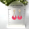 Floral Cascade earrings in blush Rose on clay couture branded size stand