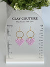 Mauve earrings on a Clay Couture Size Stand showing the height or length of the earrings